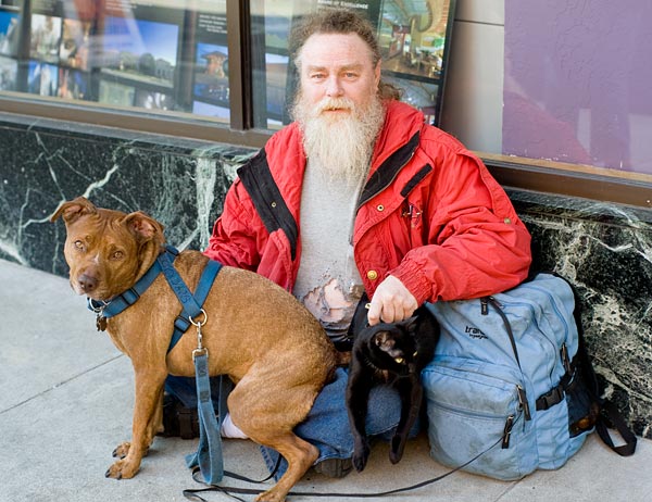 beggar with pets